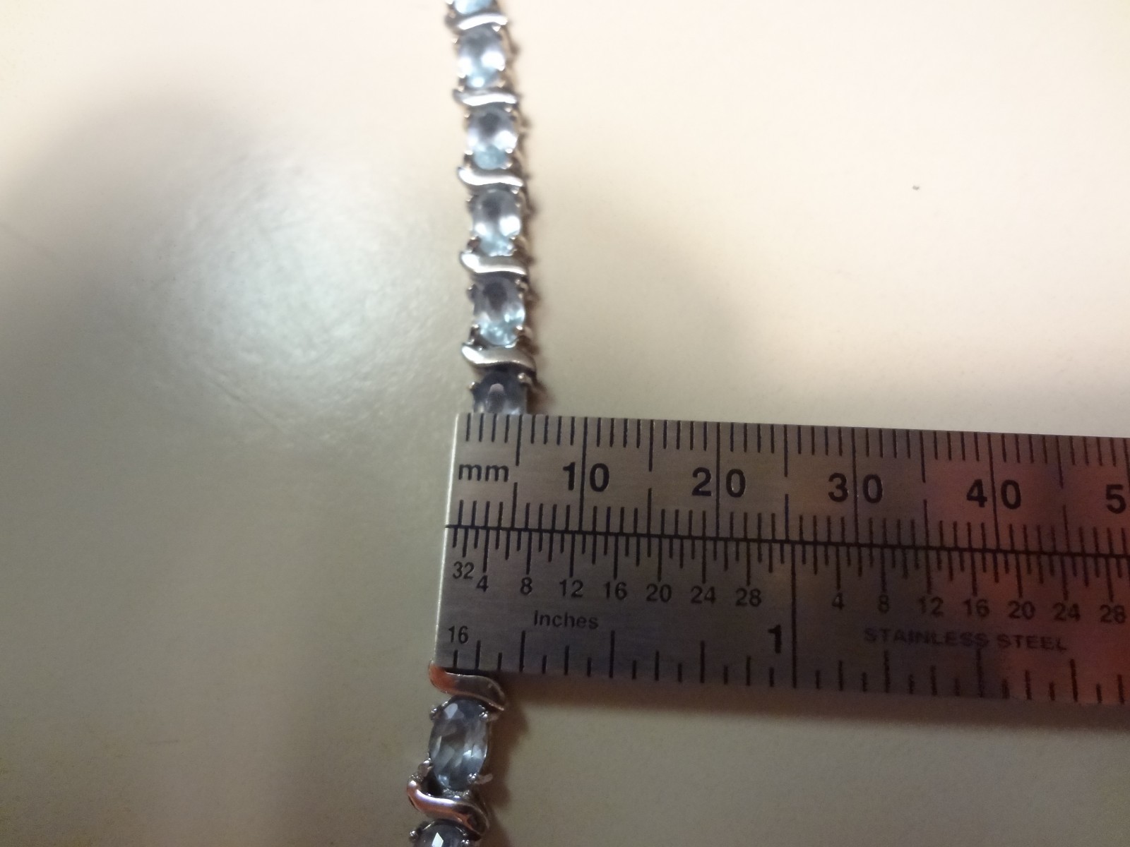 #48-DBJ-925 STERLING SILVER BRACELET LOADED WITH BEAUTIFUL STONES