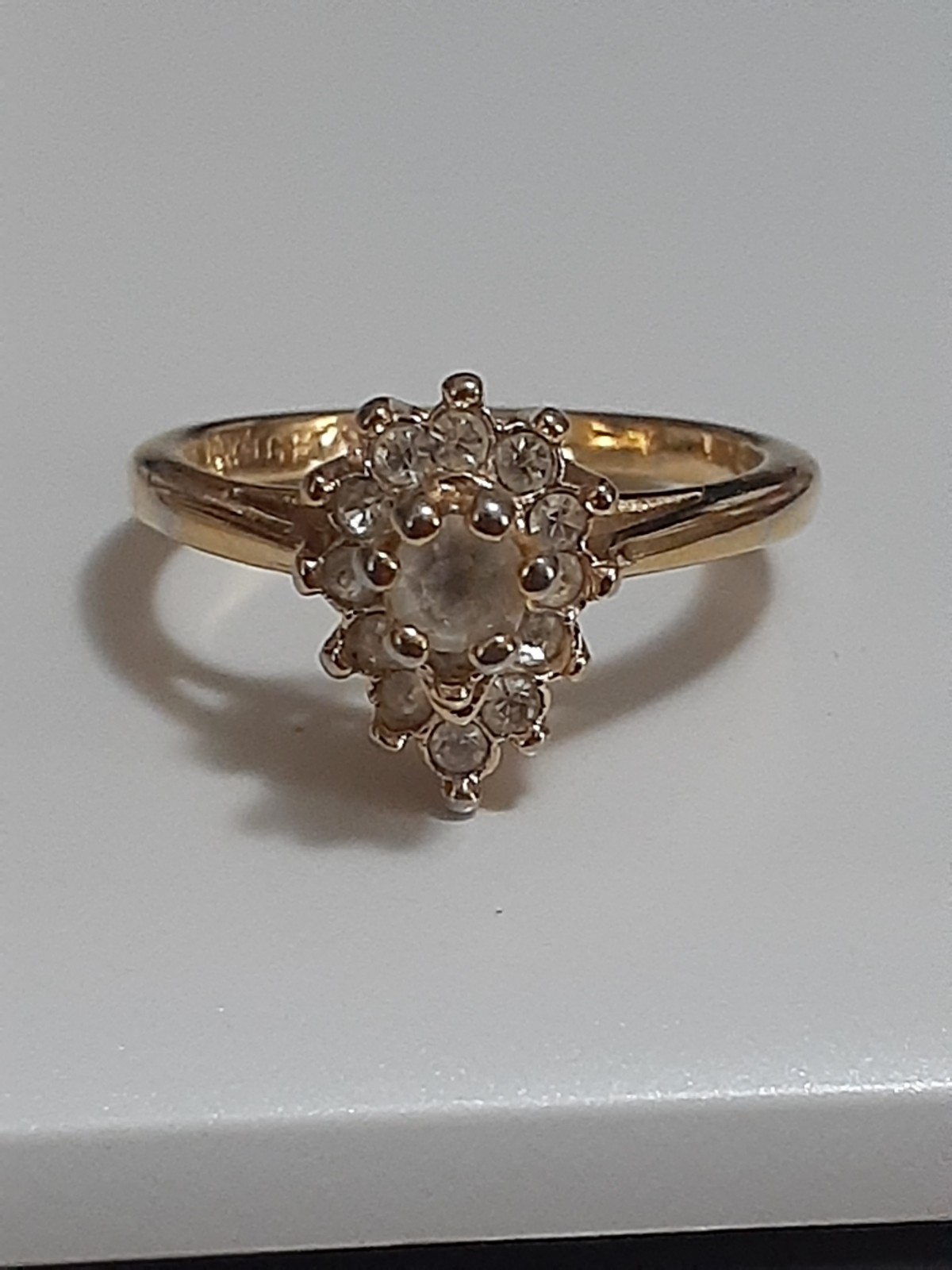 18K HGE prong set clear stone cluster ring, rosette, teardrop shape. Size 6