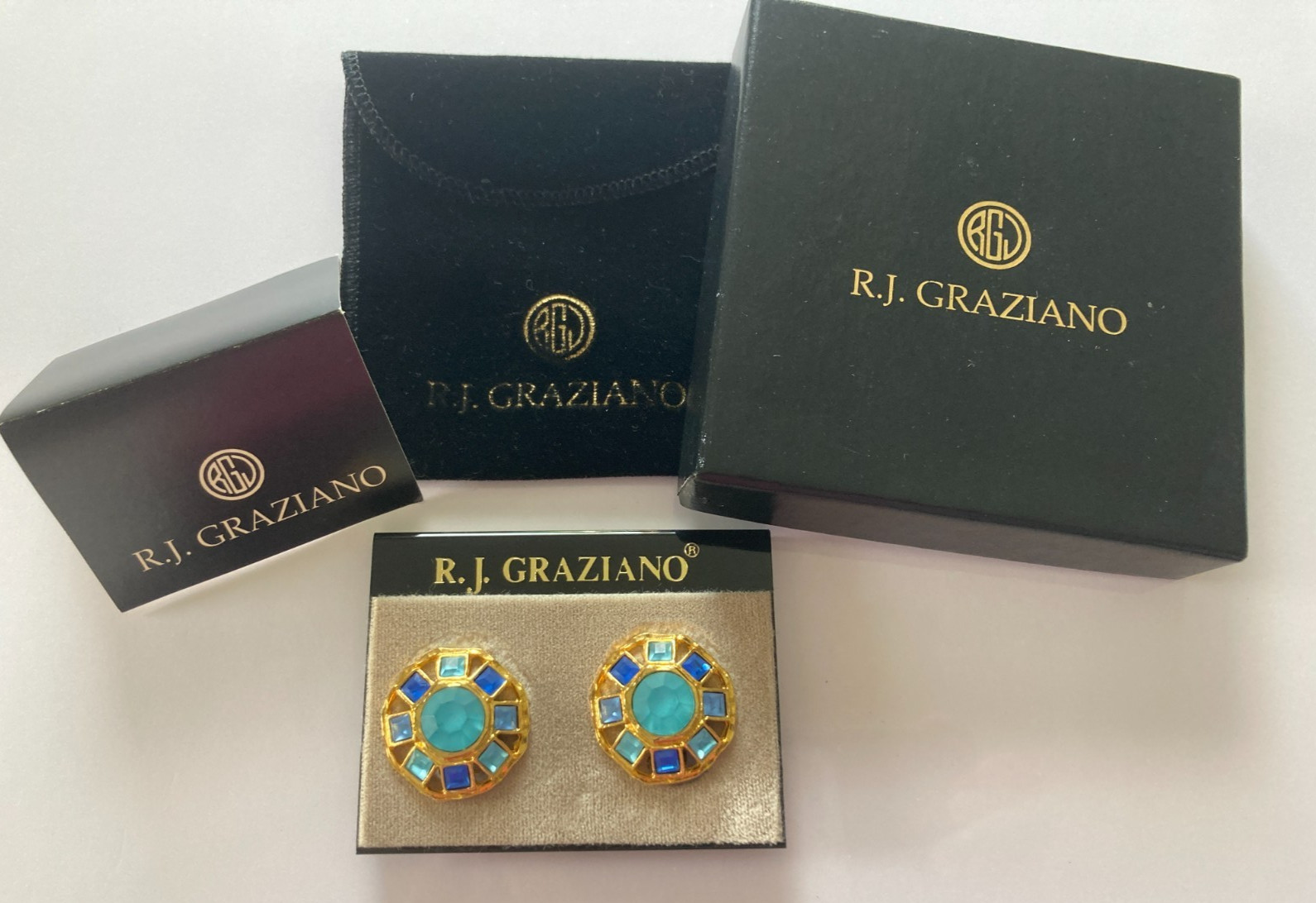 R.J. Graziano Clip on Earrings Blue Stones in Gold Color Setting