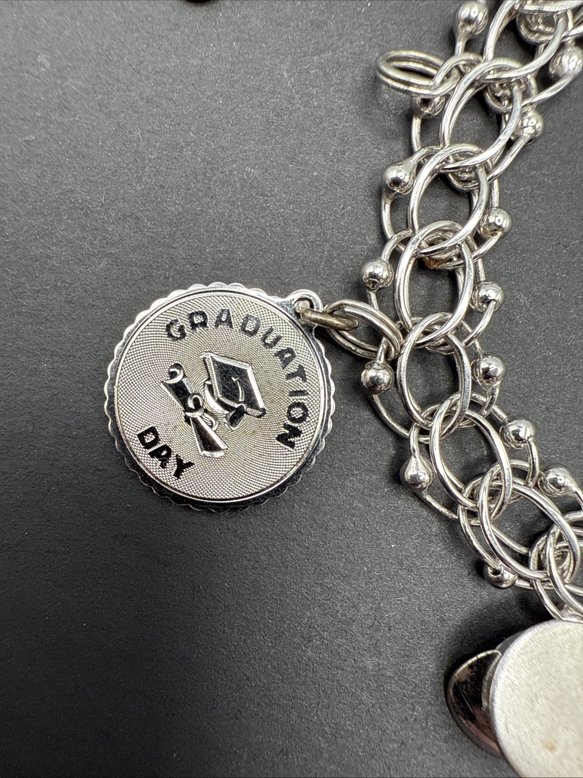 VINTAGE STERLING SILVER CHARM BRACELET Champagne Hat Barrel Grad 32 G 7” J13