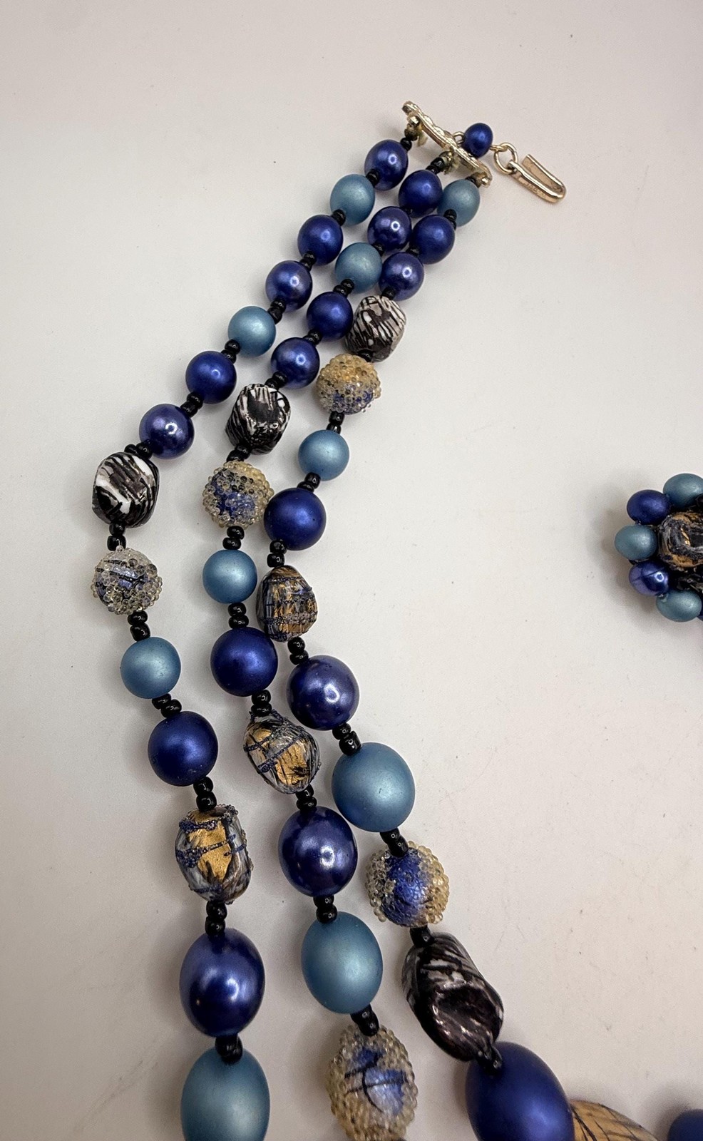 Vintage blue and gold two strand necklace and clip on earring set