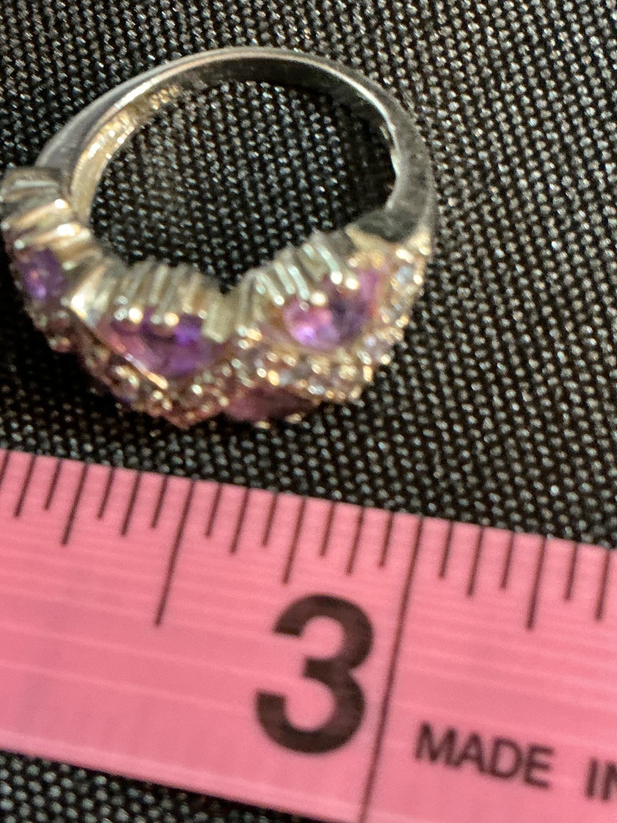 sterling silver ring features amethyst trillion-cut gemstones