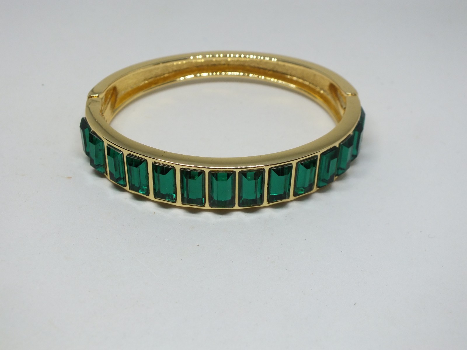 Beautiful Clamp Bracelet Gold Tone Green Rhinestones 1/2″ W x 2 3/8″ Acr ID