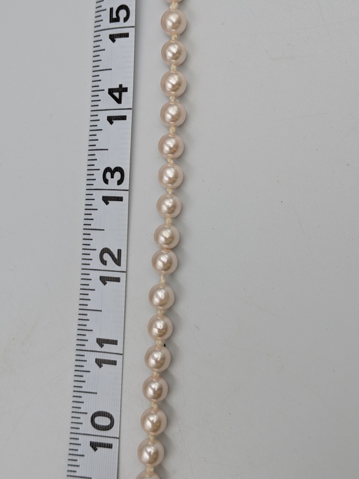 Vintage Faux Pearl Necklace Knotted with silver tone fish- hook clasp unbranded