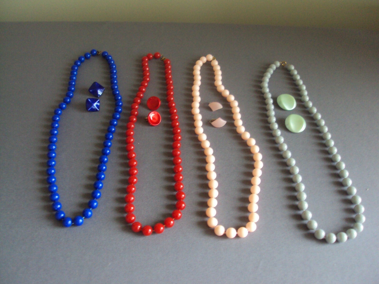 Lot of Vintage Plastic Bead Necklaces and Clip Earrings Red, Blue, Pink, Gray