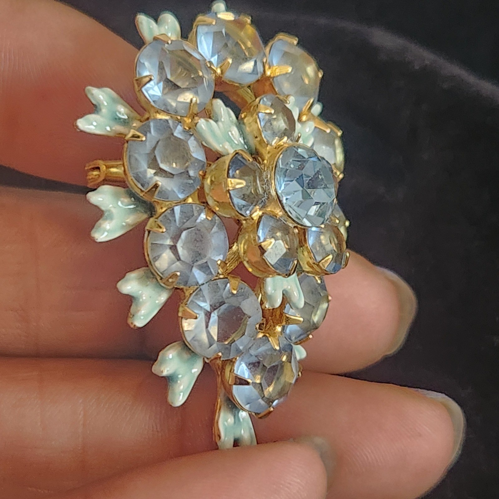 Vintage Light Blue Rhinestone Floral Cluster brooch Gold Tone Enamel Leaf Detail