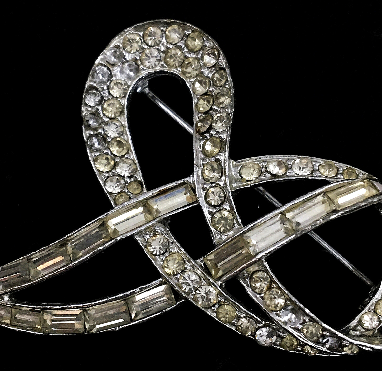 SilverTone Swirl Ribbon Brooch Pin With Clear Round with Bagette Crystals TG