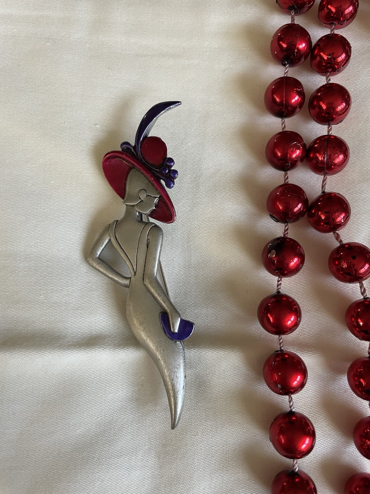 Stylized Red Hat Lady Pin And Red Beaded Necklace