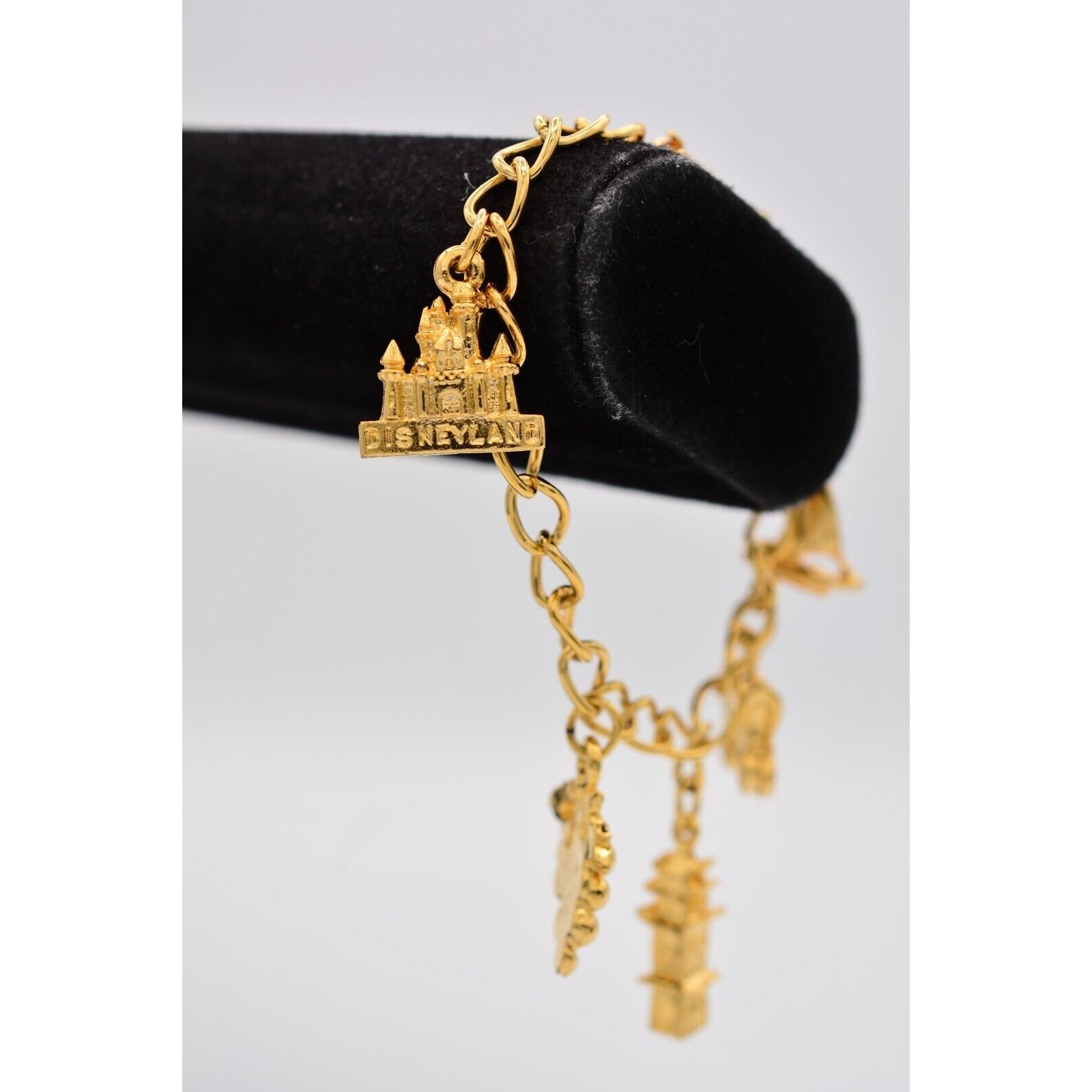 Vintage Charm Bracelet Disneyland Grapes Sailboat Gold Tone Chain Dangle BinAD