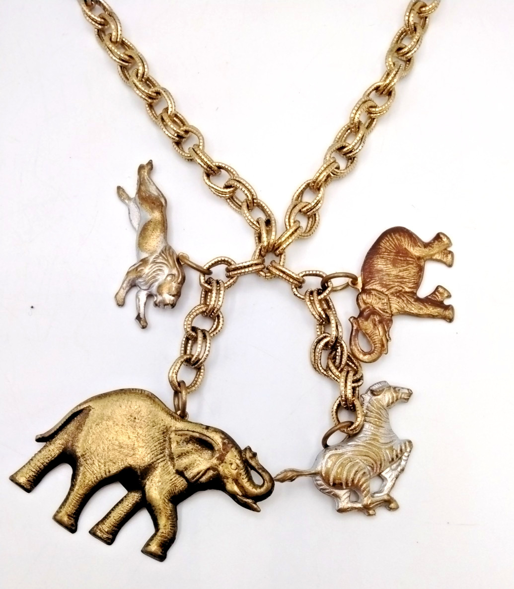 Vintage Gold Tone Safari Animal Charm Necklace Elephant Zebra Lion 18″ Statement