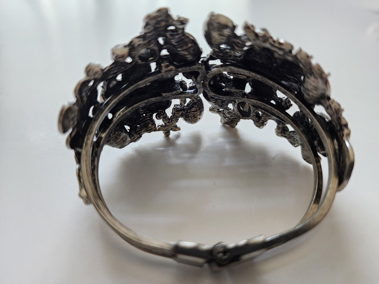 Vtg. rhinestone bracelet, front opening, hinged spring, silver tone metal