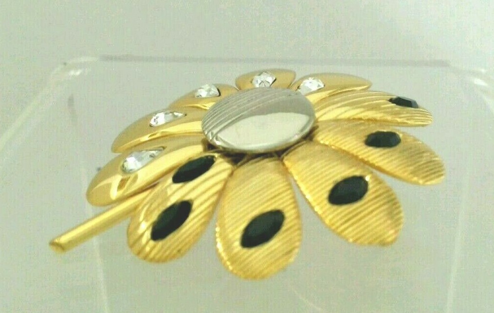 KN. “Orena” Paris Gold Tone Flower Brooch with Clear & Black Crystal signed