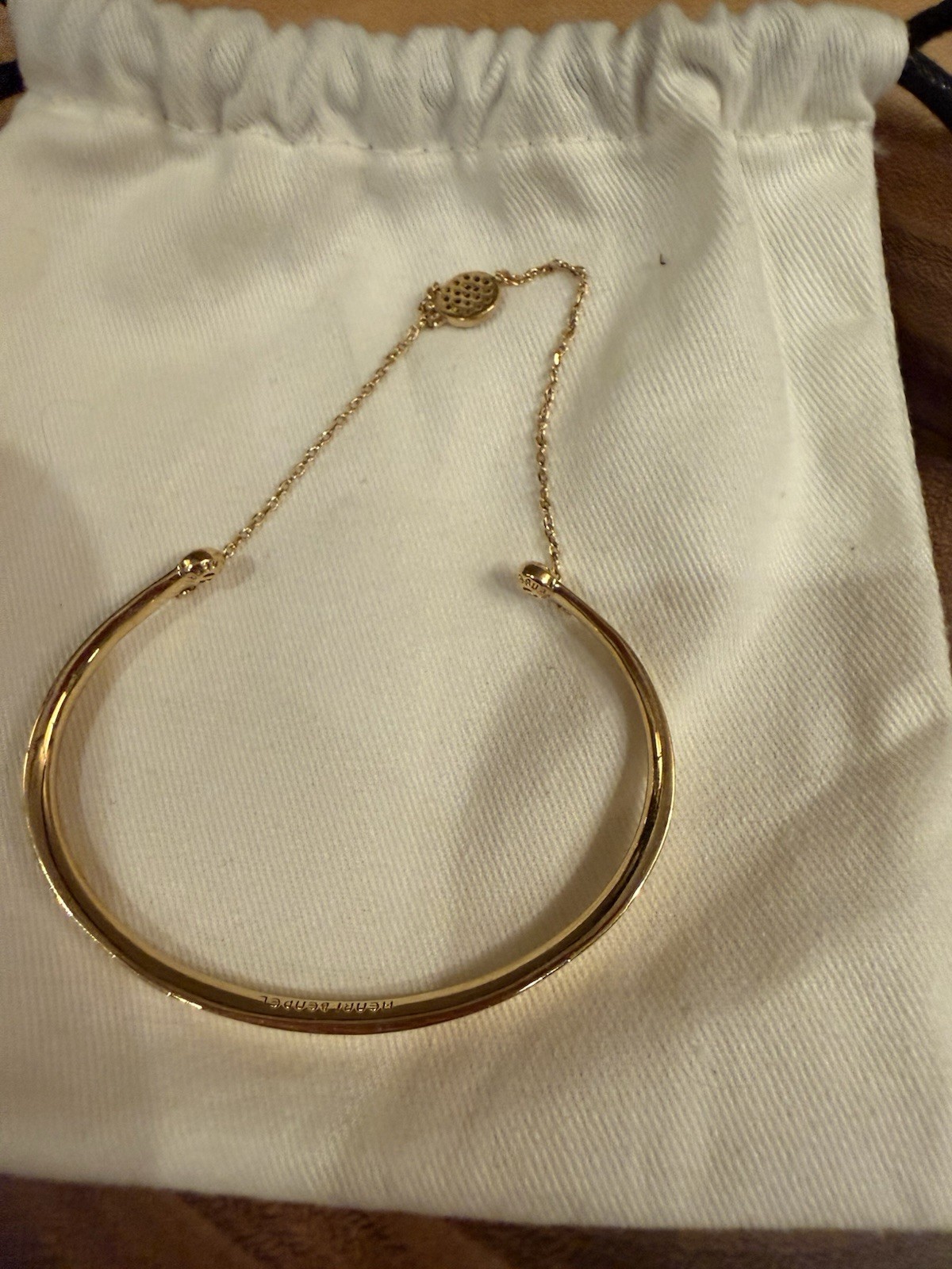 Henri bendel Gold Plated Petite Bangle Bracelet Blue Crystal Charm Safety Clasp