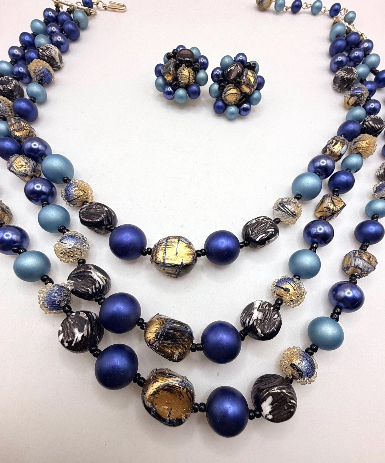 Vintage blue and gold two strand necklace and clip on earring set