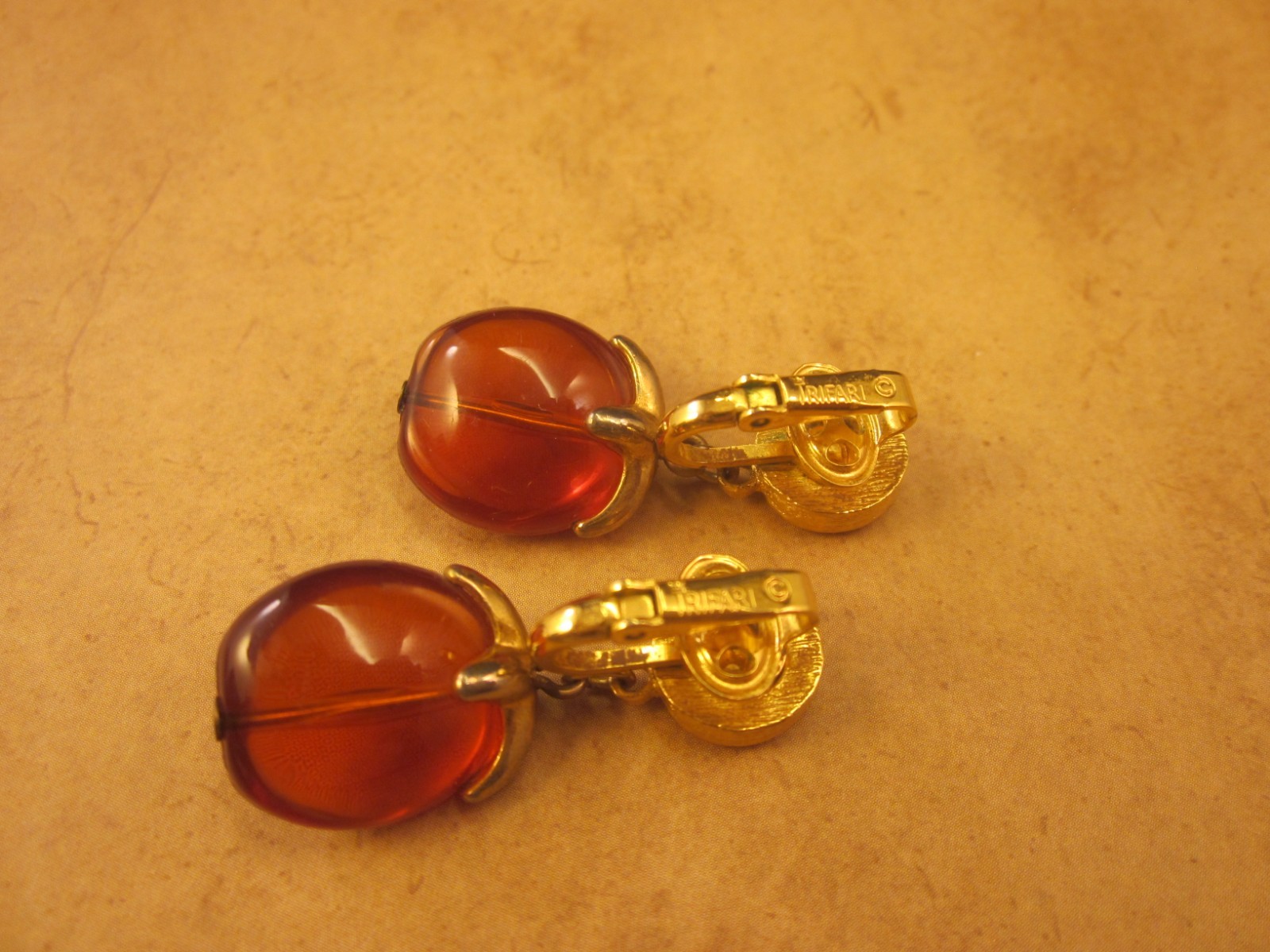 Crown Trifari Honey Amber Lucite “Waterfall Series” Gold Tone Clip-On Earrings