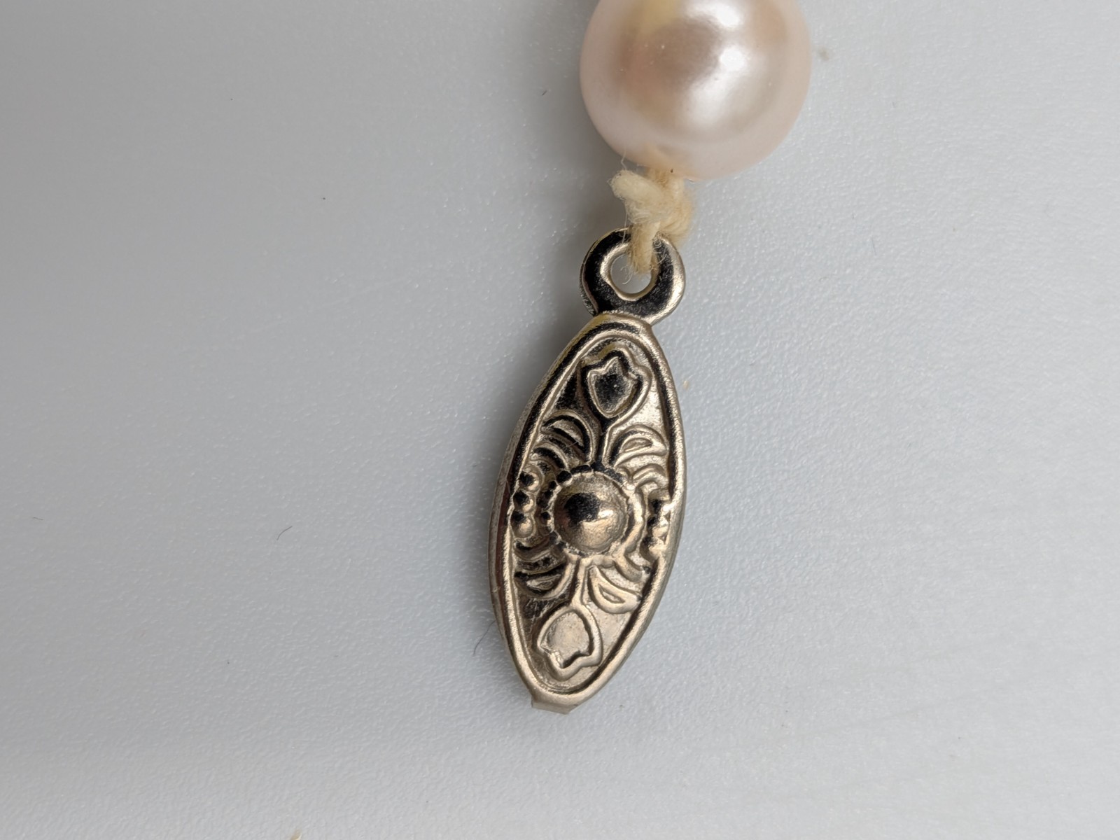 Vintage Faux Pearl Necklace Knotted with silver tone fish- hook clasp unbranded