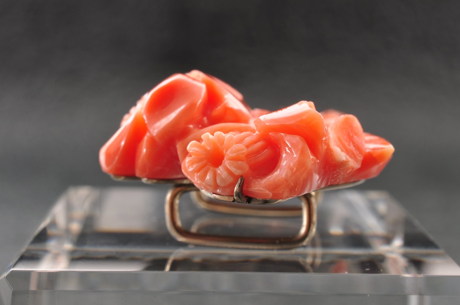 Pink coral OBIDOME, carved “camellia” (38mm (1.49in) total 50.0ct) Certificate.