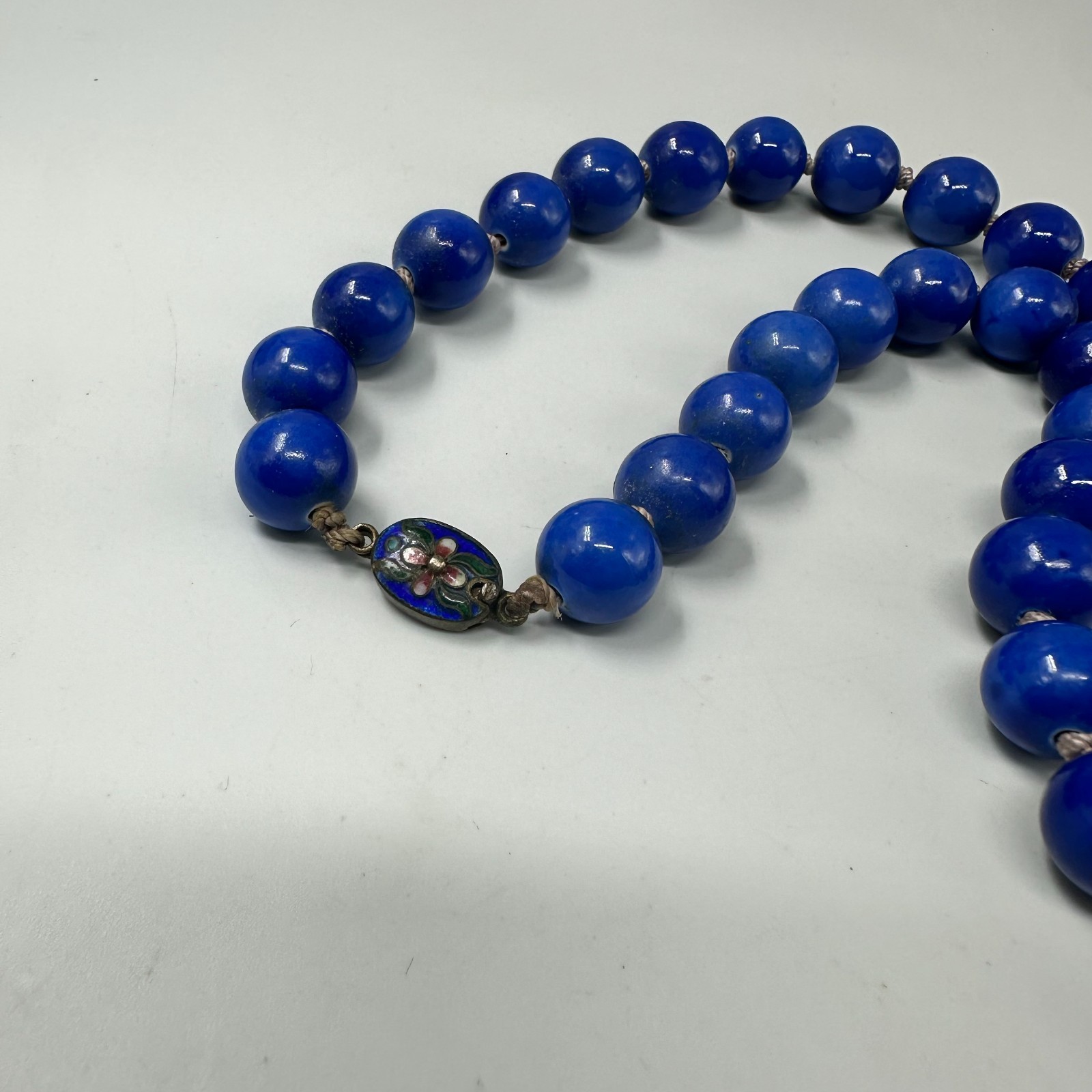 Vintage Chinese Peking Blue Glass Bead Necklace Hand Knotted Cloisonne Clasp 26″