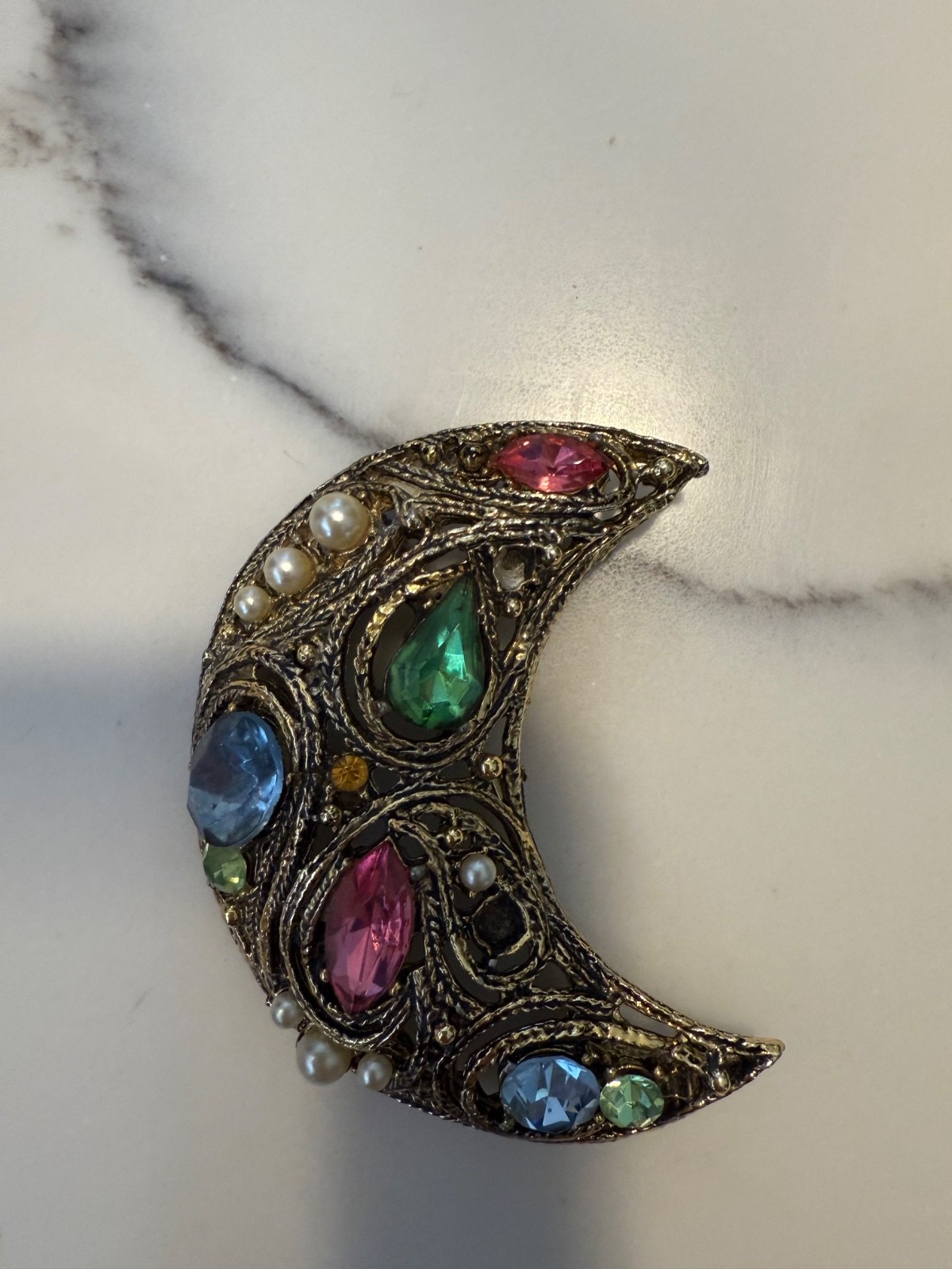 This is a vintage La Roco or Prestige jeweled crescent moon brooch with multi-co
