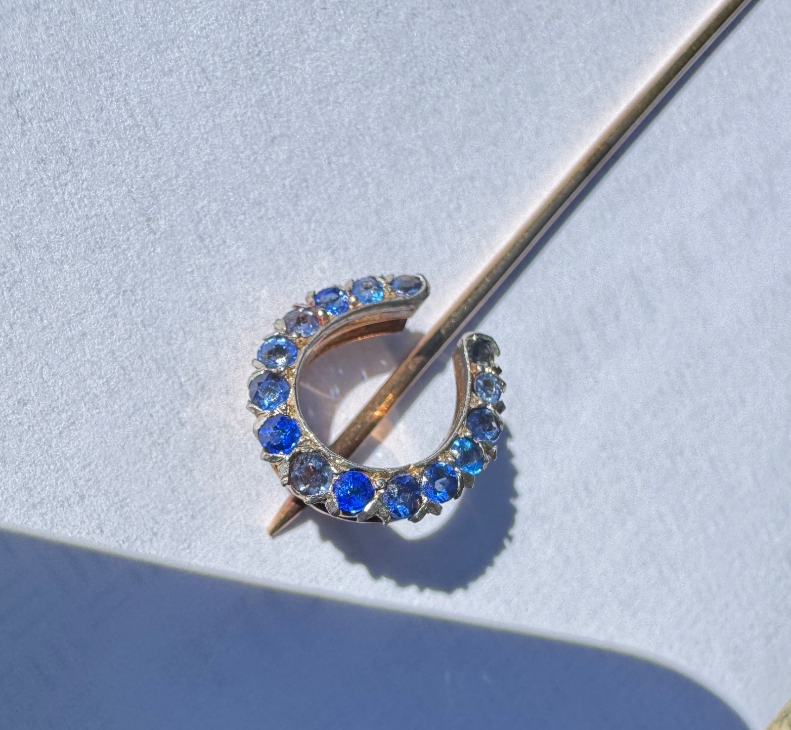 Antique 14K Y Gold Horseshoe Stick Pin w/ red garnet and blue glass 2.1 grams