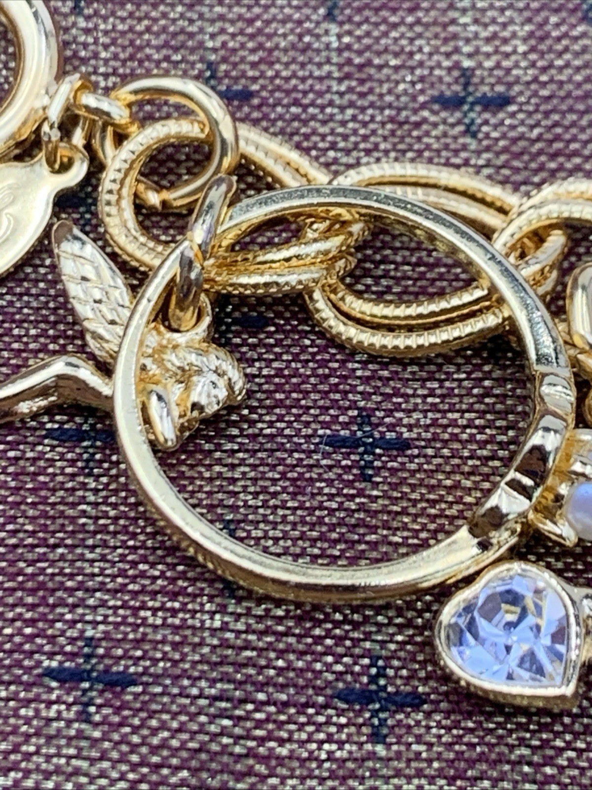 Kirks Folly Gold Tone Charm Bracelet Cupid Hearts Rings Crystals Angel