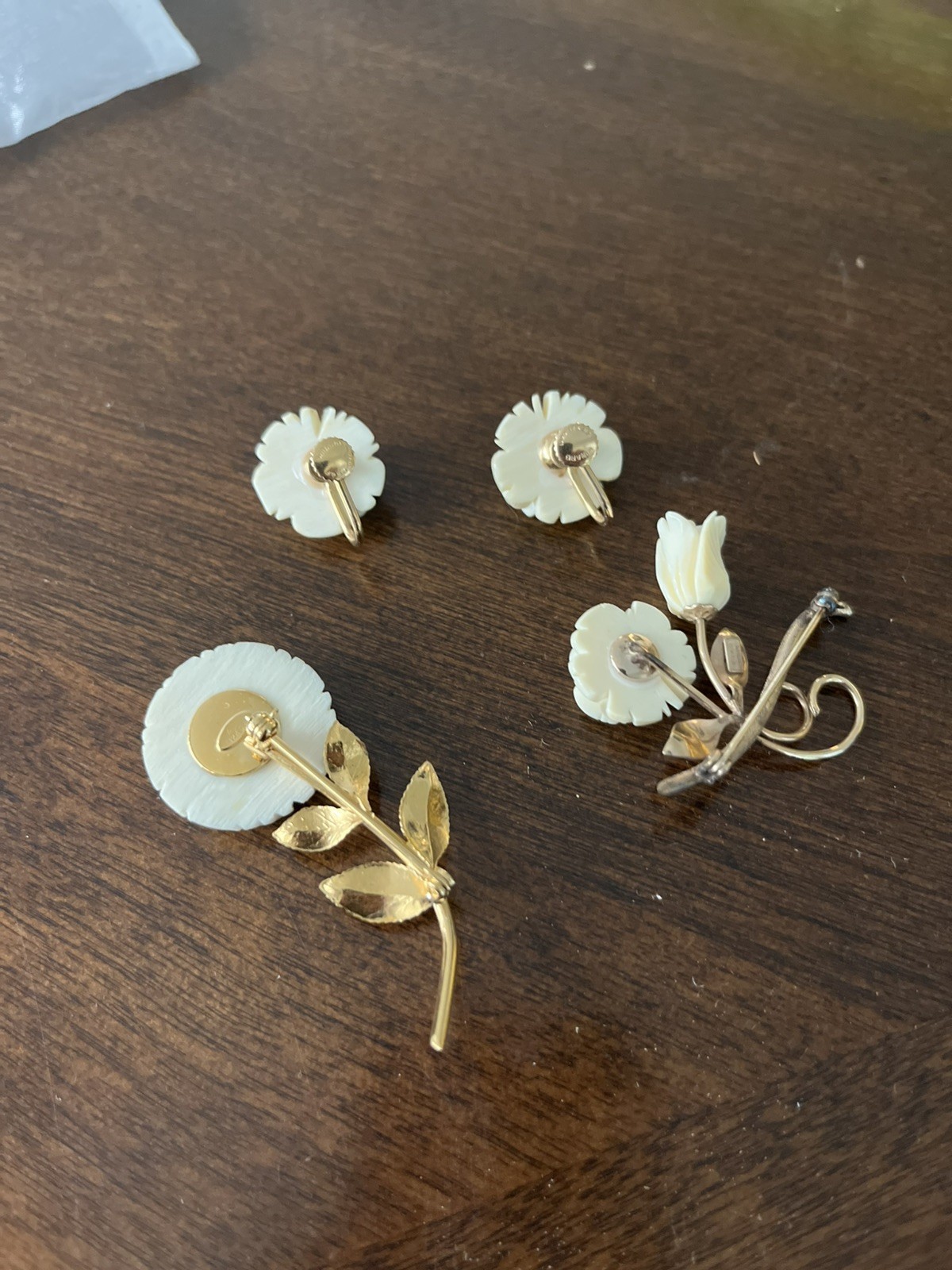White Faux Ivory And Gold Rose Earrings And (2) Brooch Set