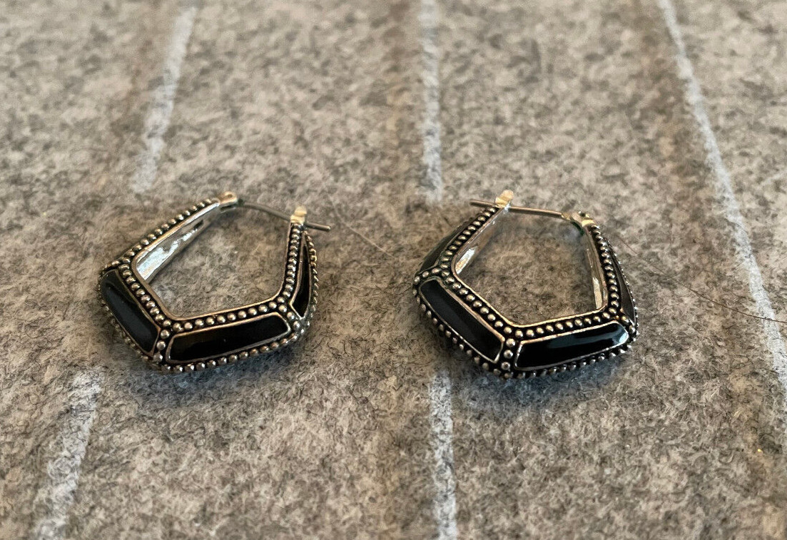 For auction is a Vintage MONET Silver Tone & Black Hoop Pierced Earring. Please