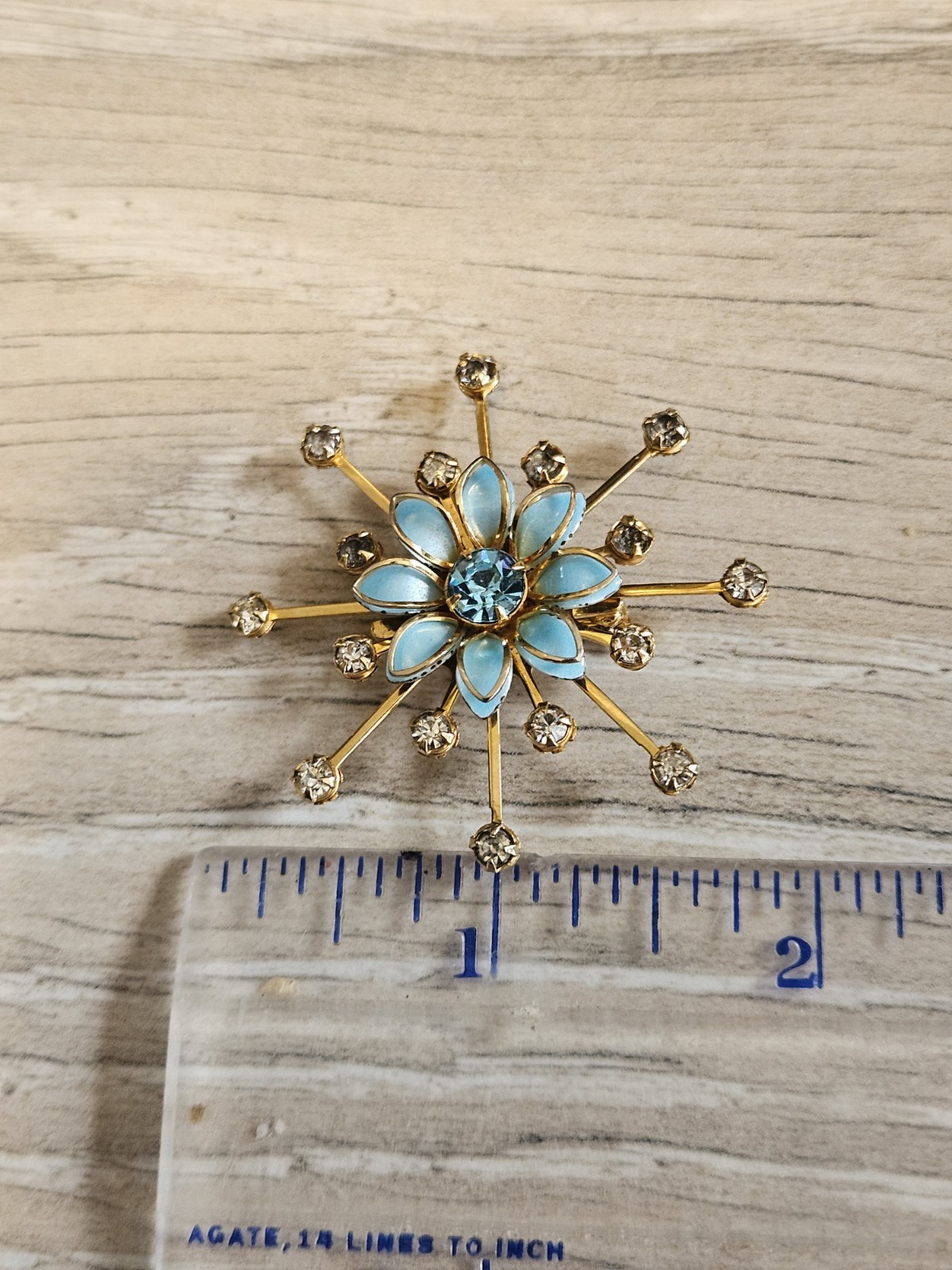 Vintage Starburst Flower blue Enamel and Rhinestones Brooch Goldtone