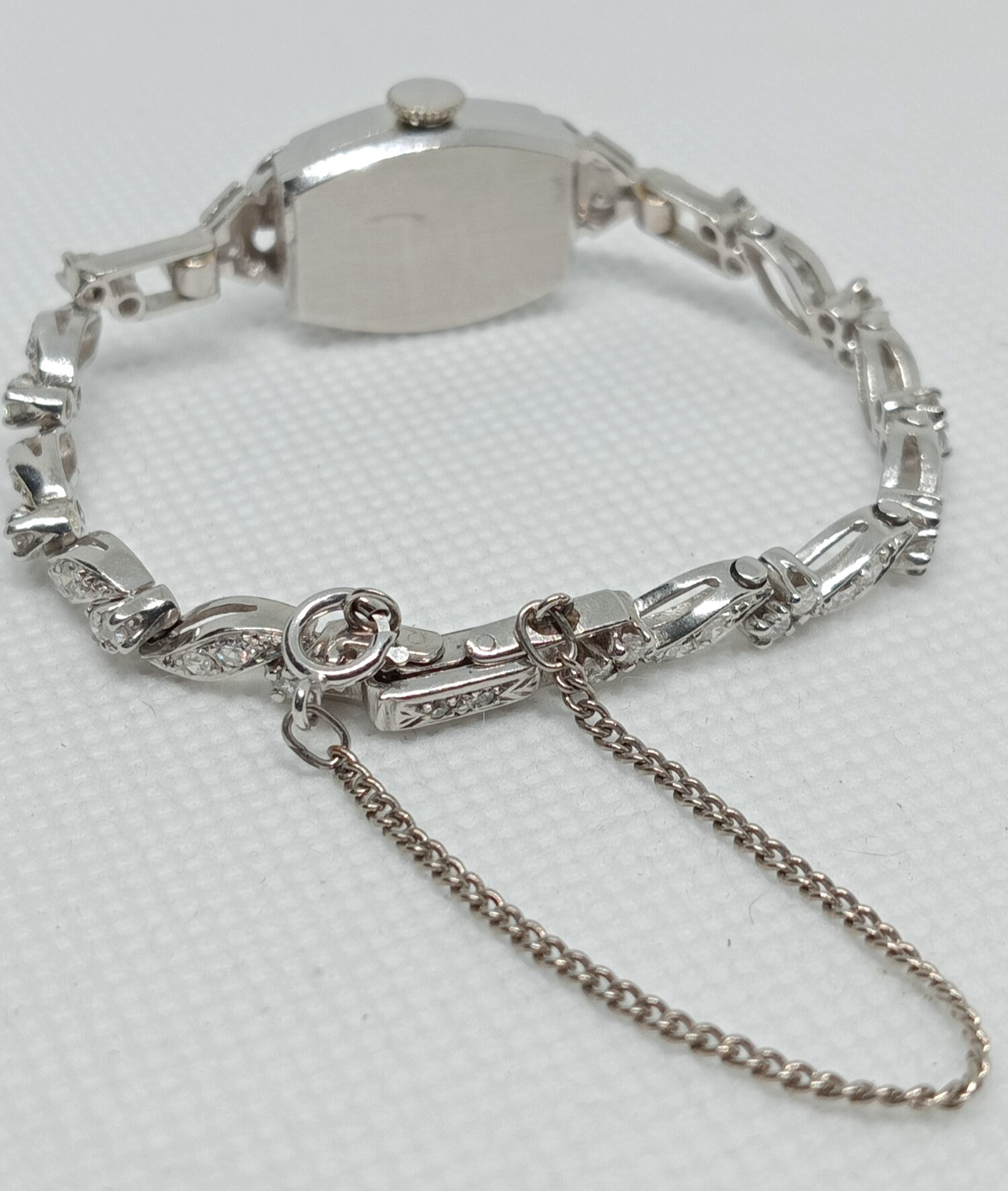 STAMPED IRID PLATINUM MANUAL CONCORD LADIES DIAMOND WRIST WATCH