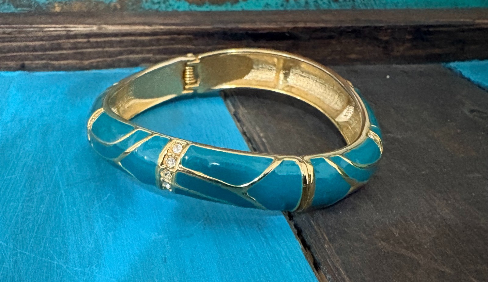 Vintage “Perfect Wave” azure blue enamel and crystal hinged bangle gold tone