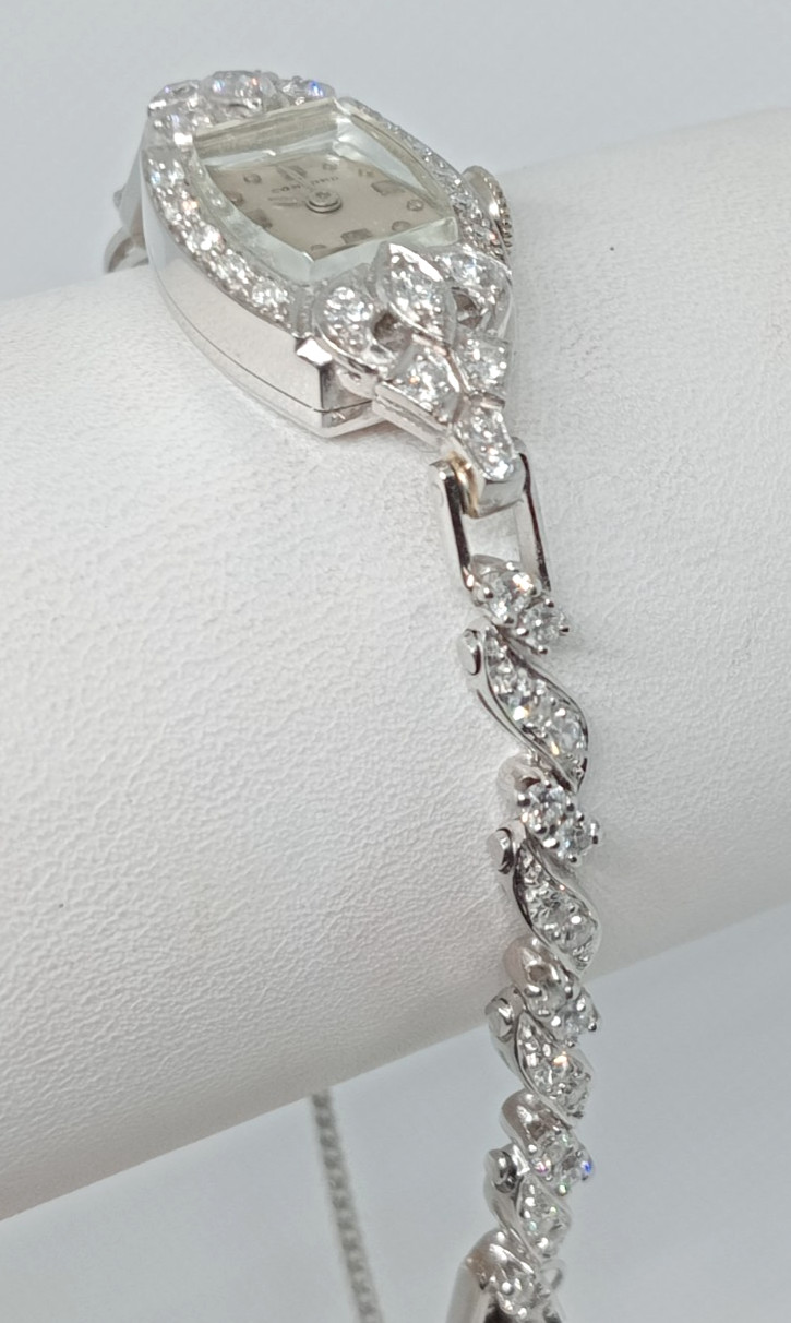 STAMPED IRID PLATINUM MANUAL CONCORD LADIES DIAMOND WRIST WATCH
