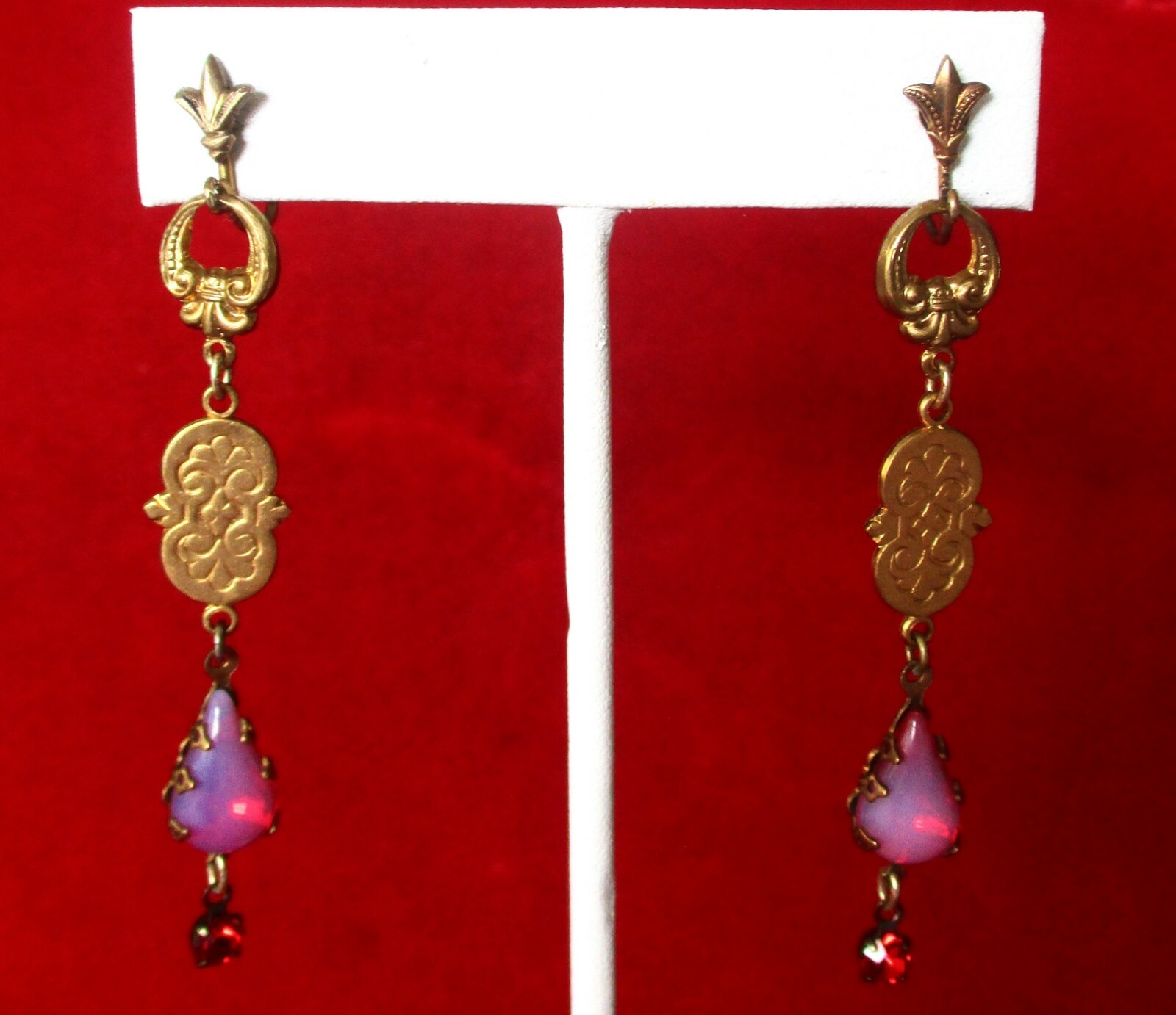 Pair of Antique Brass Screw Back Earrings With Opalescent Red Crystal Stones