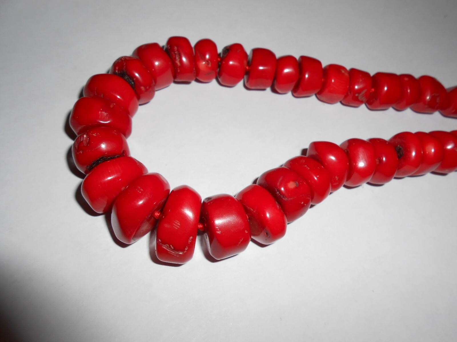 GENUINE UNDYED RED CORAL BEADS NECKLACE WITH STERLING CLASP.