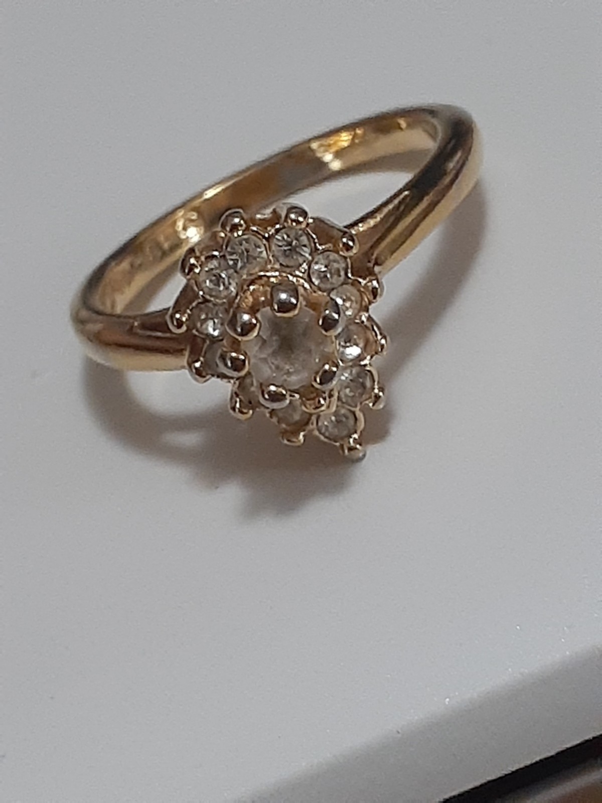 18K HGE prong set clear stone cluster ring, rosette, teardrop shape. Size 6