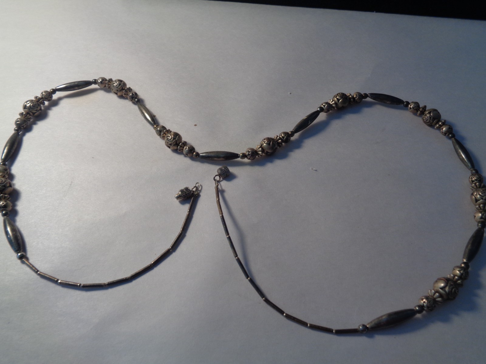 VINTAGE SOUTHWESTERN STYLE SILVER LIKE 28 INCH NECKLACE,BALLS,BARRELS,DISCS.