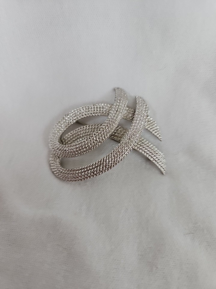 Vintage Monet Silvertone TEXTURED Twisted Ribbon Brooch approximately 2-1/8”