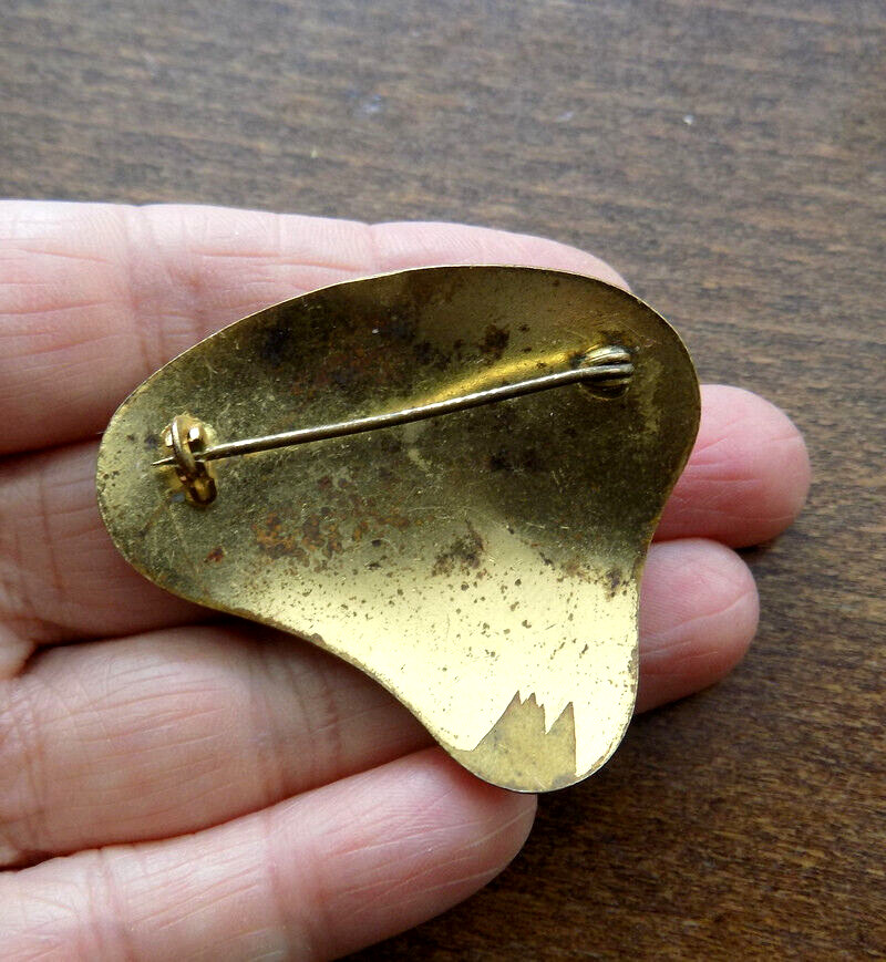 Vintage Mother-of-Pearl Brooch on a gold-colored metal base.