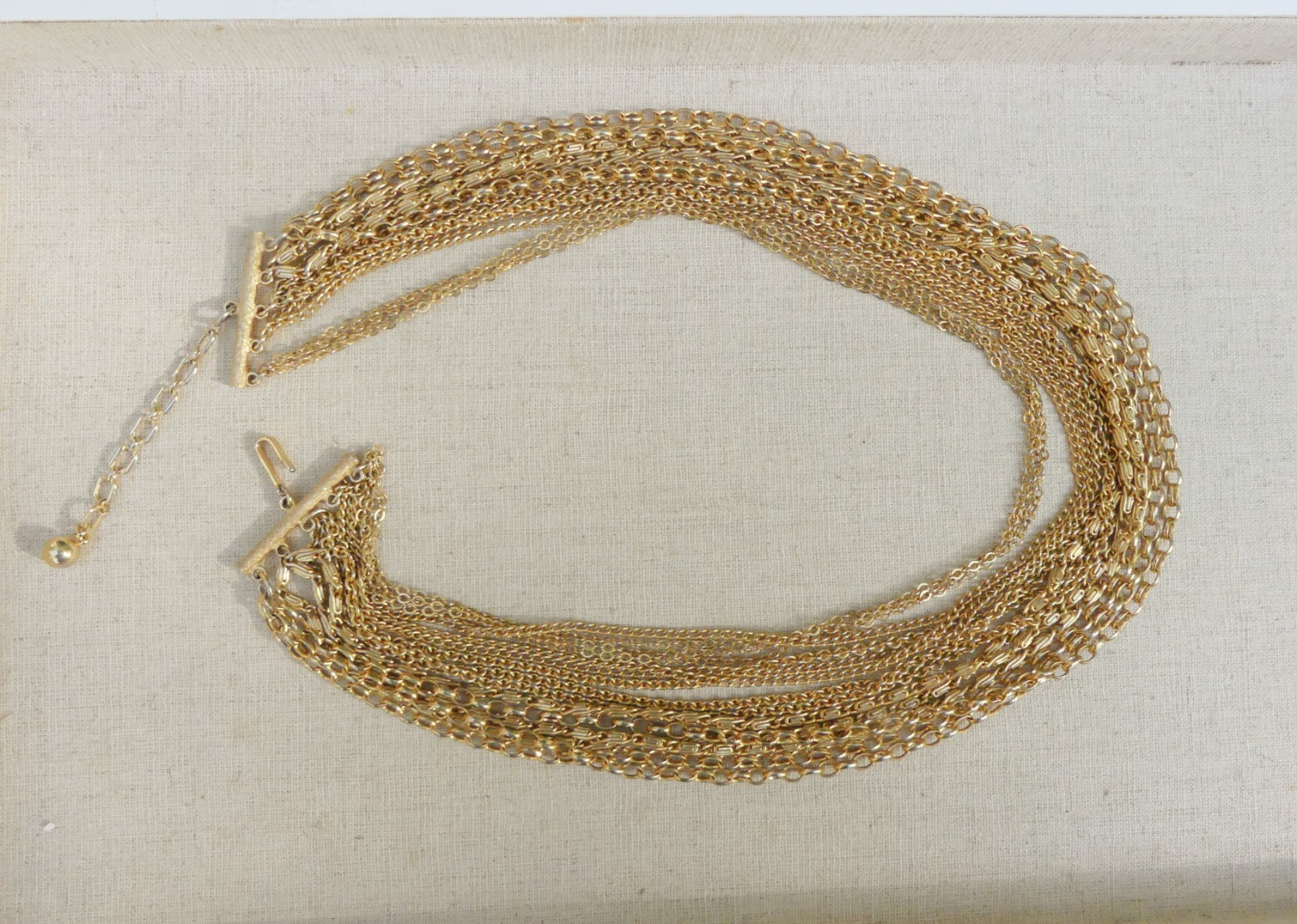 Vintage Trifari multistrand chain necklace goldtone multichain19-22 inches swag