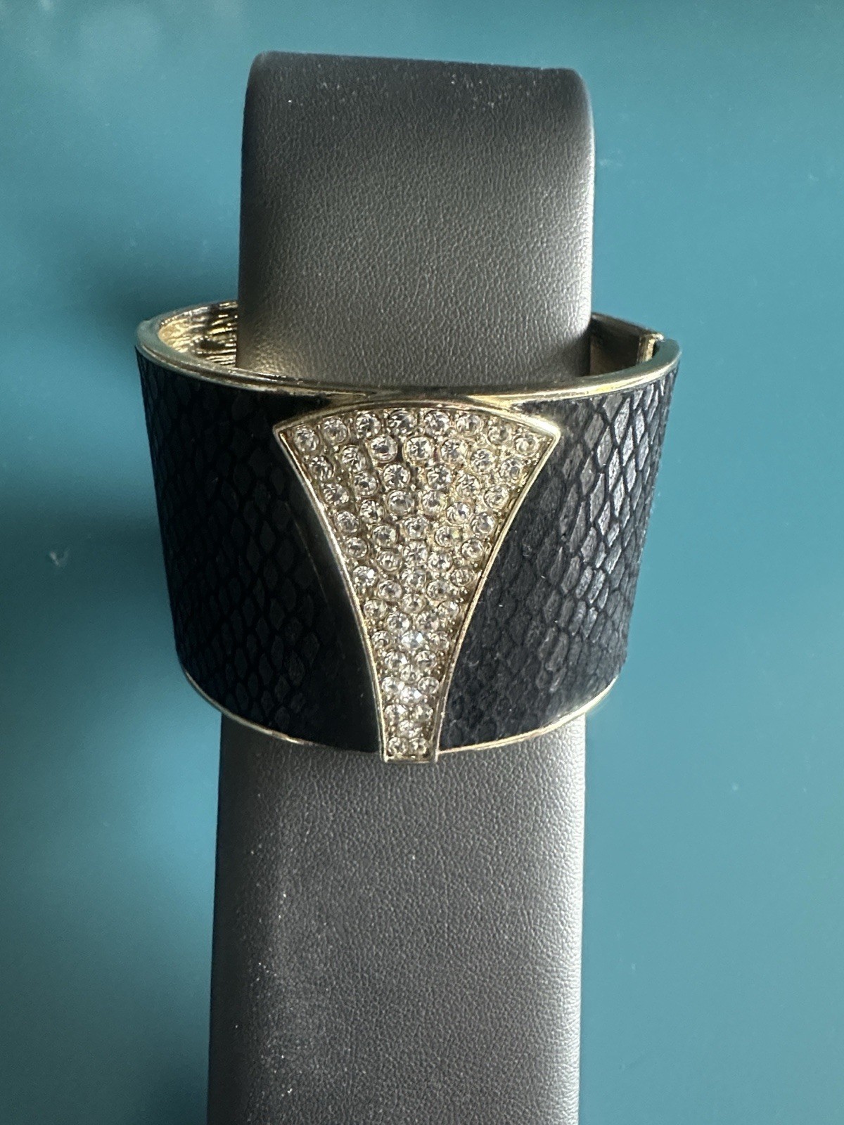 Faux black leather and rhinestone bangle cuff bracelet with gold color trim VTG
