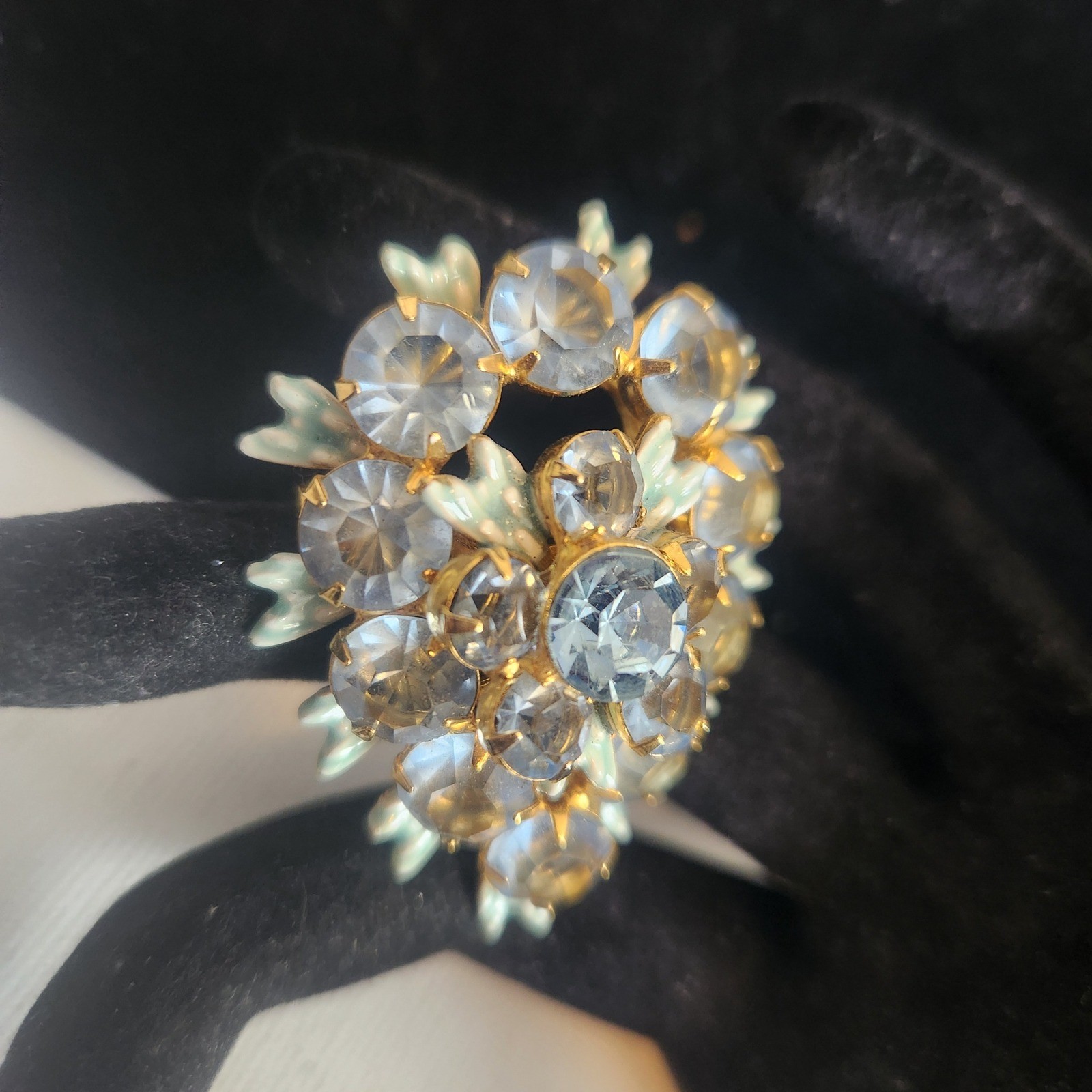 Vintage Light Blue Rhinestone Floral Cluster brooch Gold Tone Enamel Leaf Detail