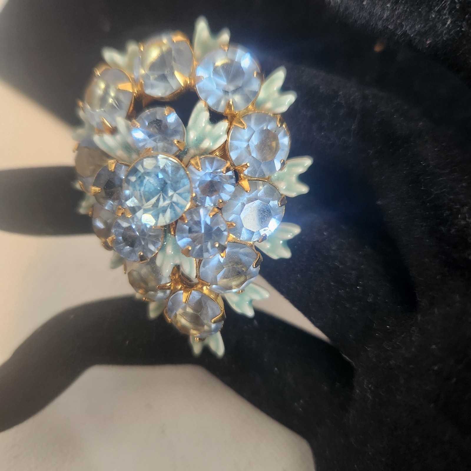 Vintage Light Blue Rhinestone Floral Cluster brooch Gold Tone Enamel Leaf Detail