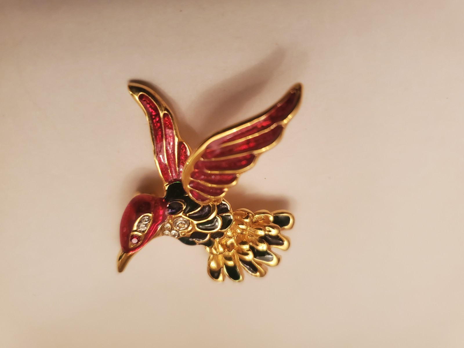 Hummingbird Brooch Features Gold-Tone Finish With Red And Black Enamel Detailing