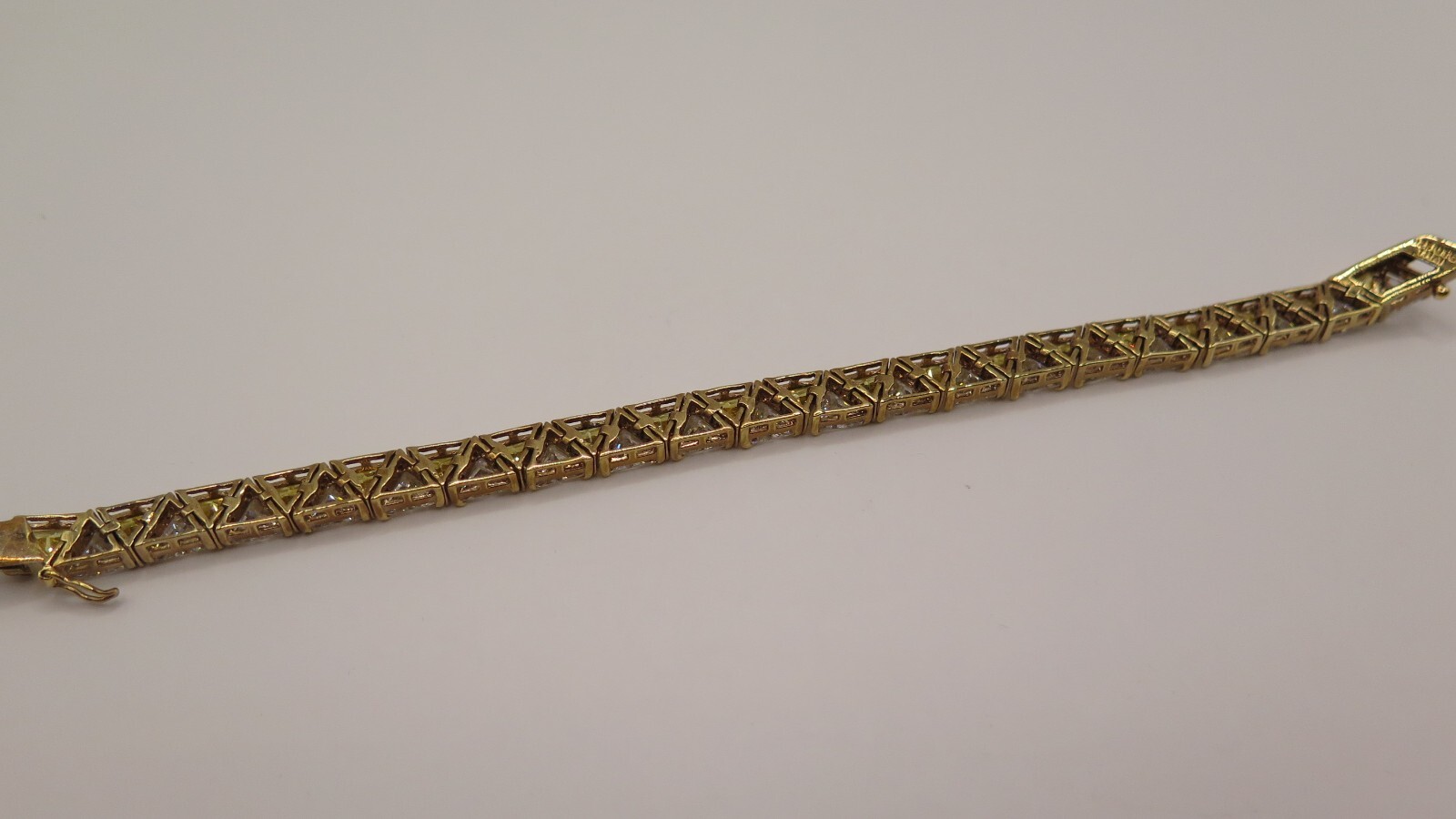 UTC Trillion Cut Tennis Bracelet, Gold Tone