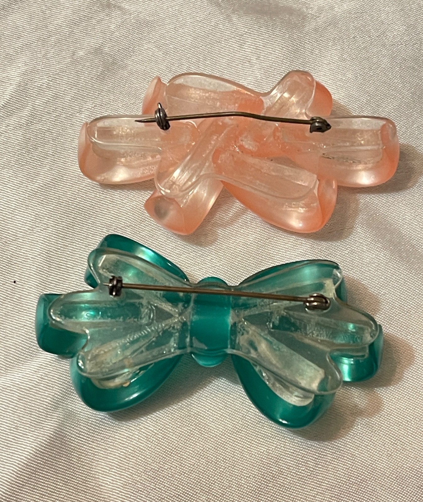 Two Thermoset Plastic Ribbon & Bow Brooches~1 Pink~1 Green-Kinda Moonstone Look