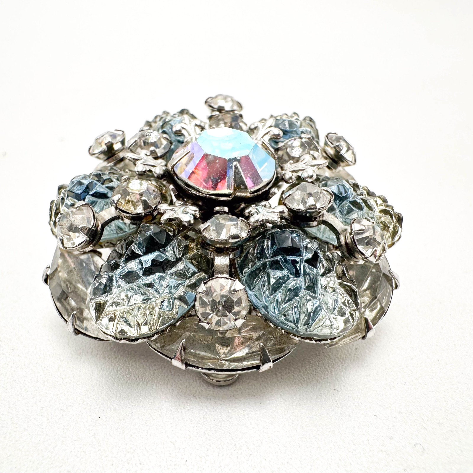 Vintage Brooch AB Icy Blue Molded Stones Silver Tone Tiered Rivet Unsigned 1.5″D