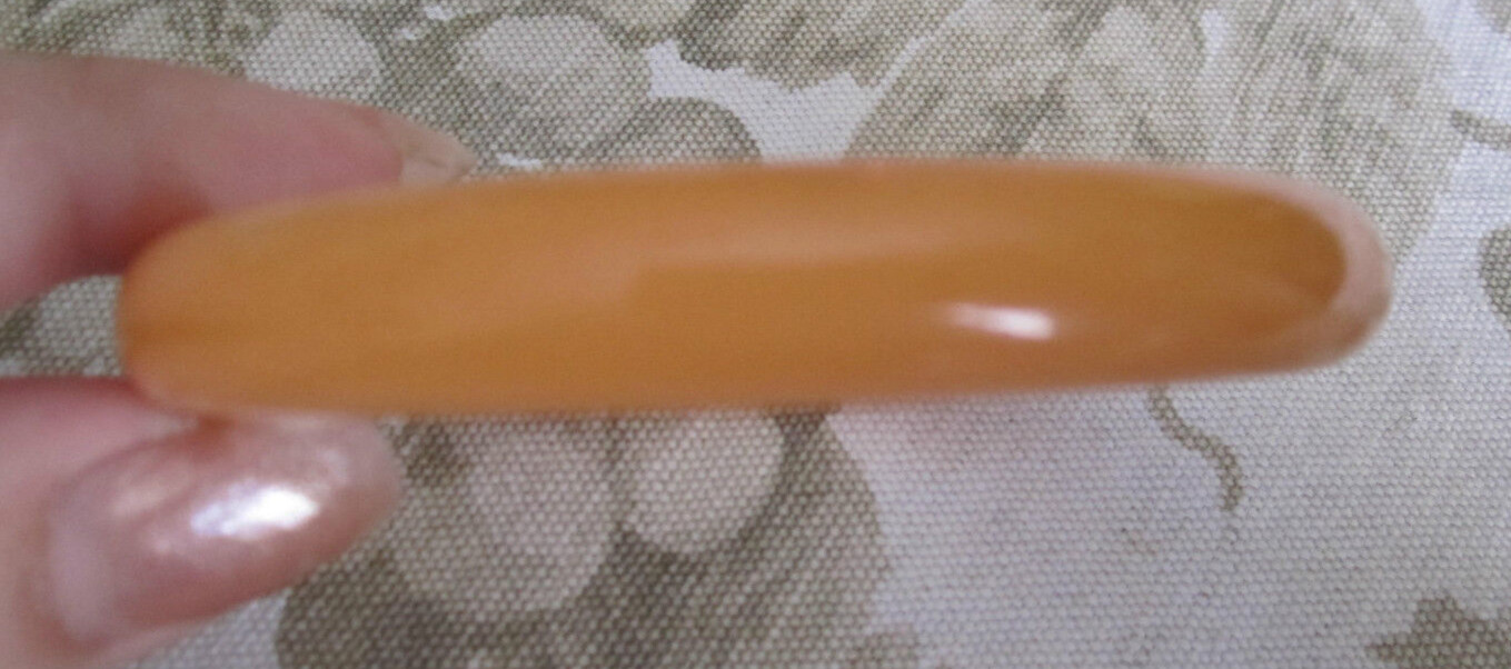 Vintage melon orange acrylic bangle bracelet, 1/2″ wide x 3″ across