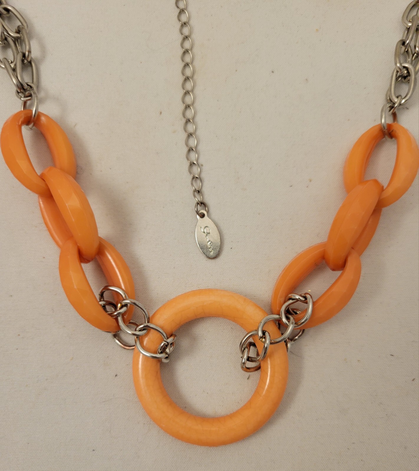 Gwen Women’s Silver Tone Necklace with Salmon Colored Large Plastic Links