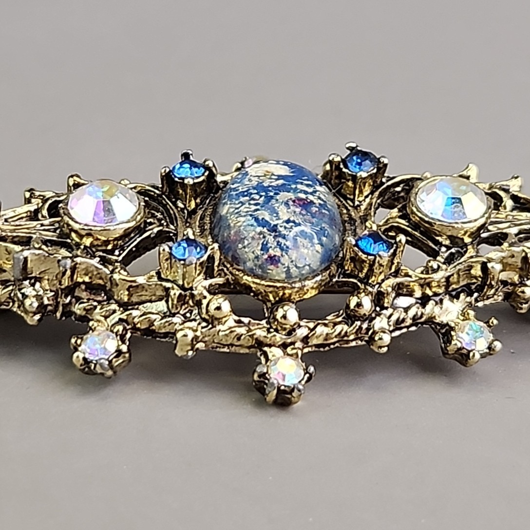 Vintage Foiled Glass Brooch Aurora Borealis Blue Oval Gold Tone 2 3/8″