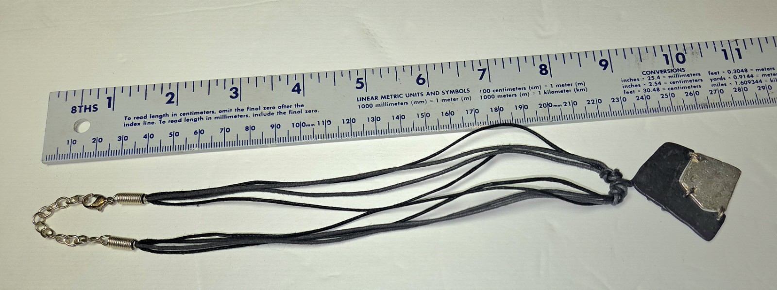 Vintage Handmade Organic Metal Abstract Pendent On Black Layered Cord