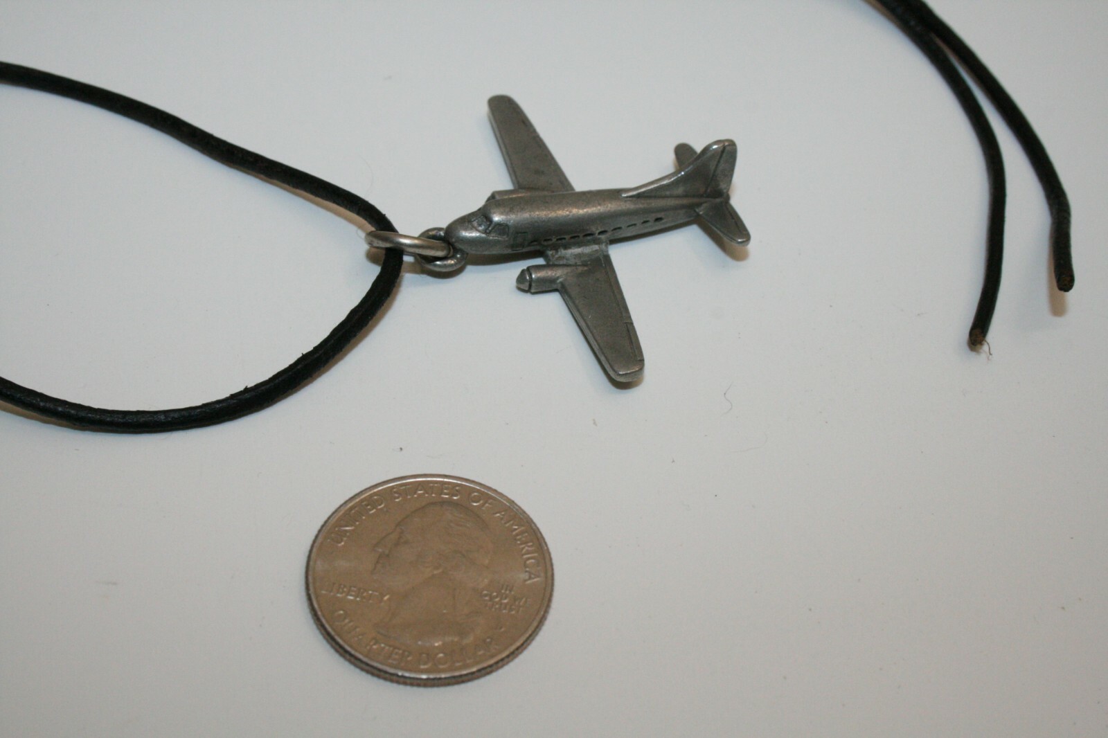 VINTAGE (JIM) CLIFT SIGNED PEWTER AIRPLANE PLANE CORD NECKLACE